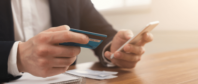 Man paying bills with electronic bill presentment and payment application