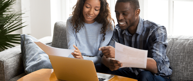 Couple reading transactional mail